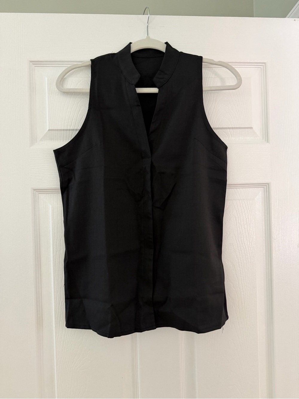 La Femme Black Sleeveless Split-Neck Blouse